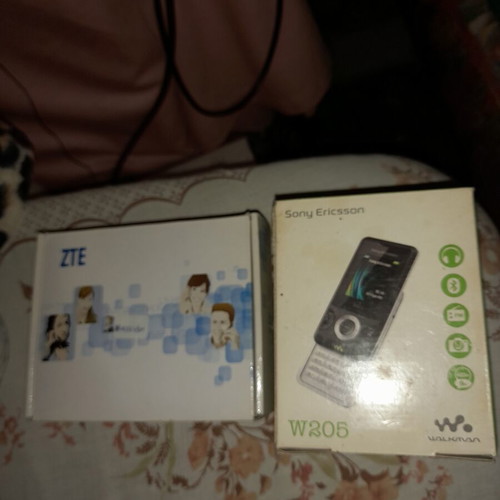 Collectible phone packaging like new with all papers from ZTE and Sony Ericsson