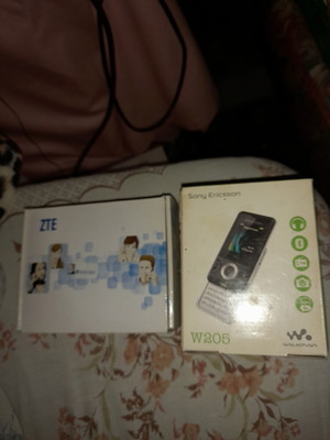 Collectible phone packaging like new with all papers from ZTE and Sony Ericsson