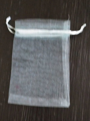 Pouch like new, very light blue, 14x10 cm