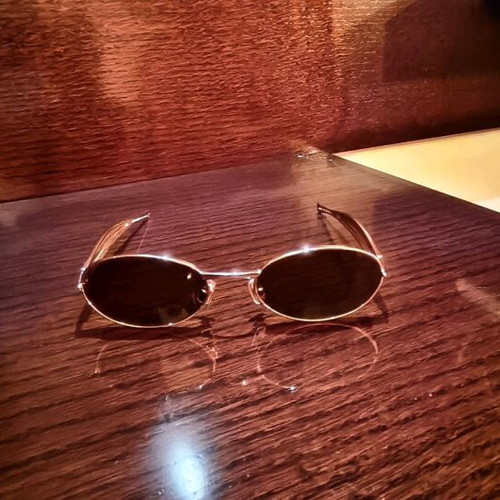 Bottega Veneta sunglasses like new, gold color