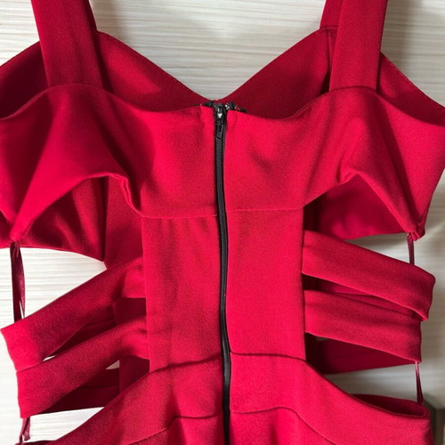 Red one-piece jumpsuit like new with side cutouts and bust support