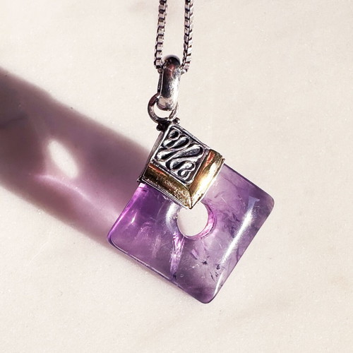 Vintage pendant with amethyst in 925 silver and gold
