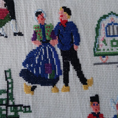 Embroidery with traditional costumes and Dutch scenes like new