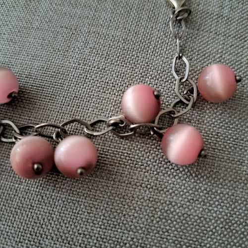 Silver women's bracelet like new with pink stones