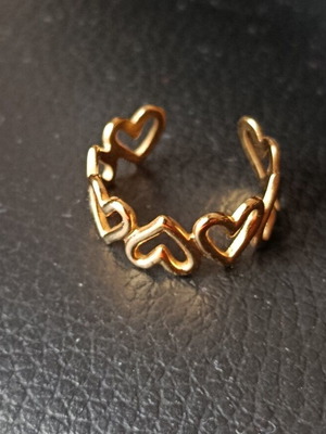 Heart ring adjustable size unused, gold color