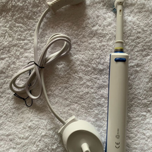 Oral-B electric toothbrush used, rechargeable