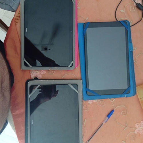 Huawei MediaPad T5 and Alcatel 1T tablets used, with cases