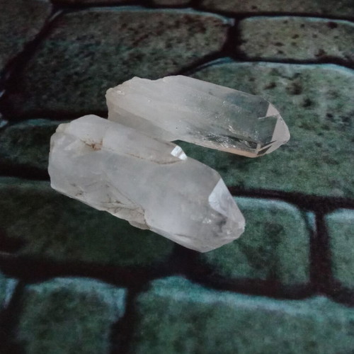 Clear quartz points set like new, two pieces