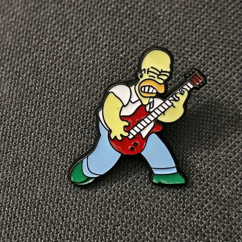 Simpsons pin with guitar like new