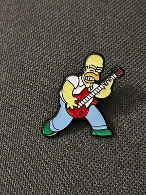 Simpsons pin with guitar like new