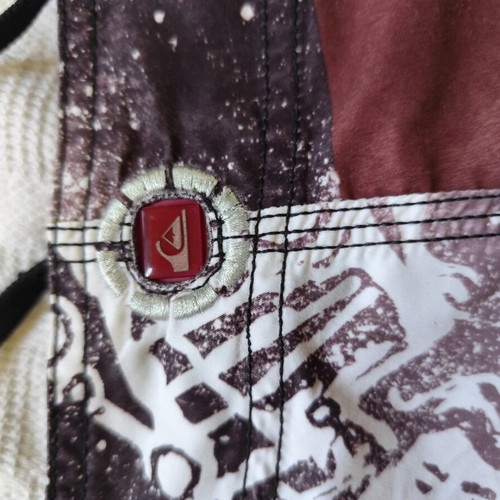Quiksilver swim shorts used, size 30, multicolor