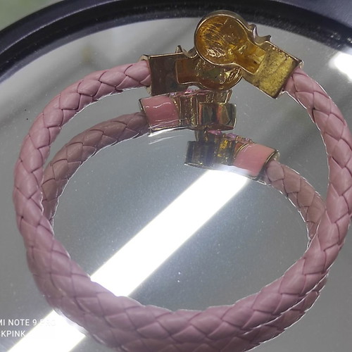 Pink bracelet with gold new