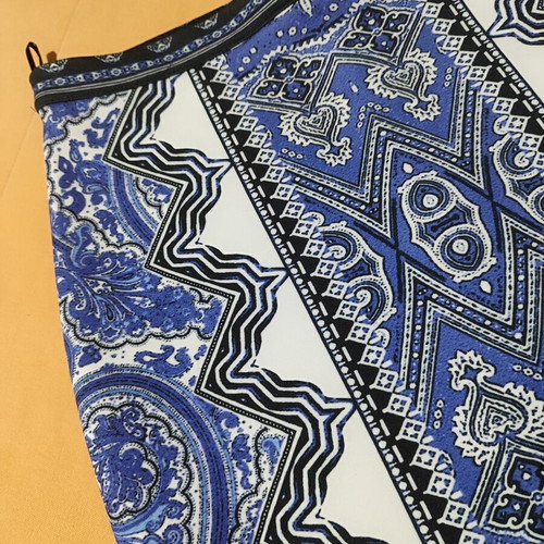 Innocent pencil skirt with print and back slit, black and blue