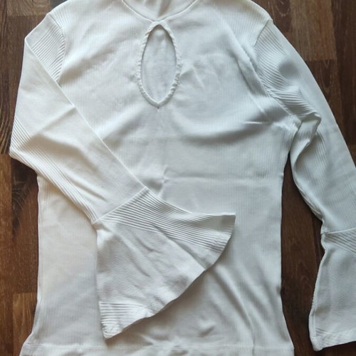 White Zara women's turtleneck blouse new with chest cutout and bell sleeves