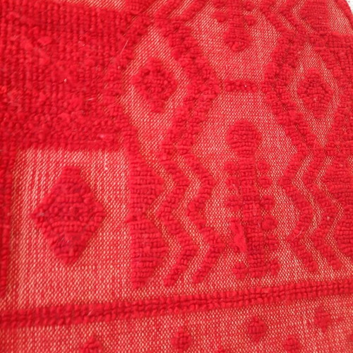 Handmade wool blanket used in red color