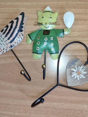 Set of 3 metal wall hooks like new