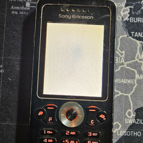 Sony Ericsson W302 Walkman used with USB charging cable