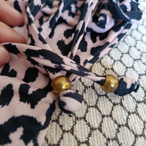 Leopard print swimsuit S-M like new with cut bottom and good chest lining