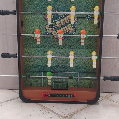 Table football used, missing ball, functional