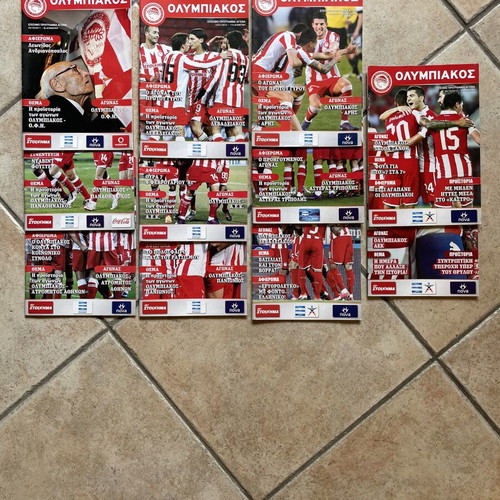 Olympiakos match programs set of 11, like new, 2011-13 seasons