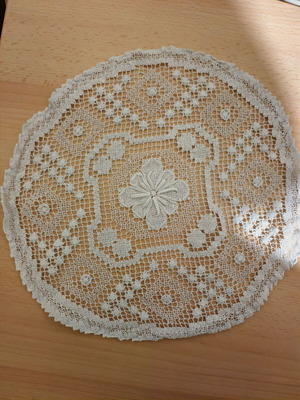 Round embroidered doily used, diameter 28cm