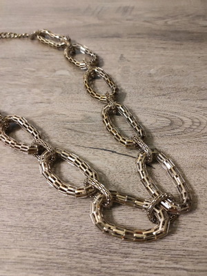 Chain-style belt in gold color like new, size 70