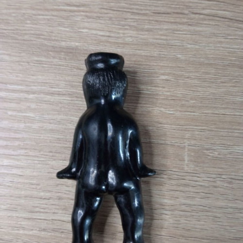 Vintage black plastic boy figure used
