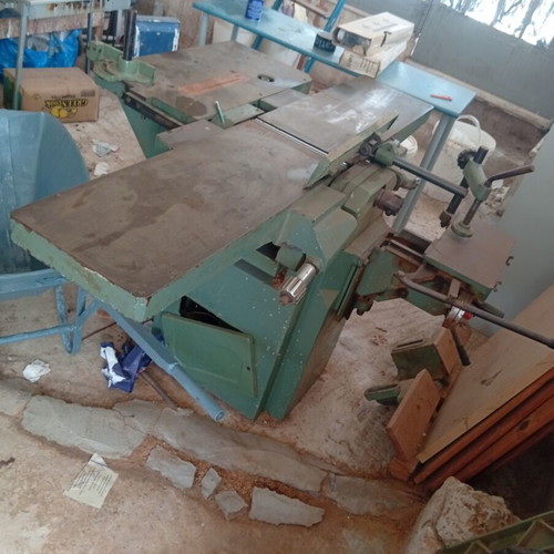 Bandsaw with planer, table, and bench used, includes tools