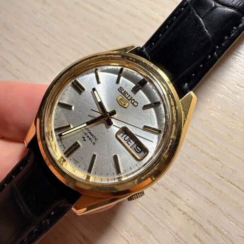 Seiko Sport 5 watch used with black leather strap and daydate