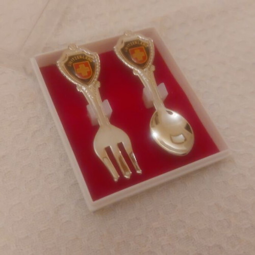 Collectible Switzerland spoon and fork set like new, in box