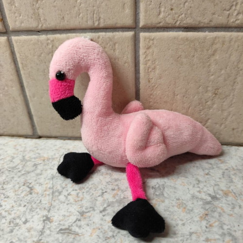 Flamingo doll like new