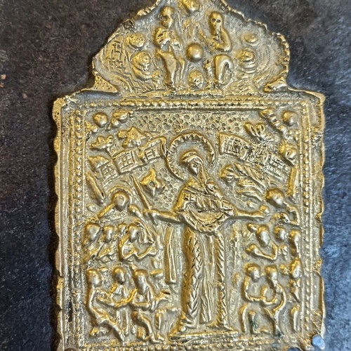 Old brass religious icon on wood, 17x14 cm