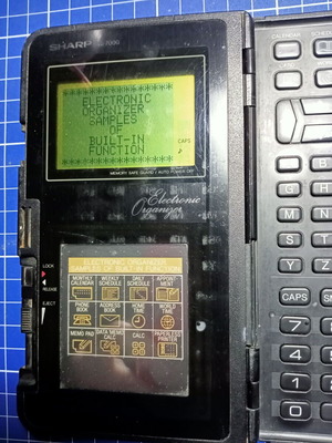 Sharp IQ-7000 electronic organizer used, vintage PDA 1988