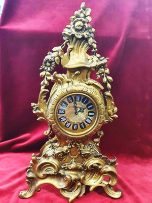 Old German brass table clock used with carved details