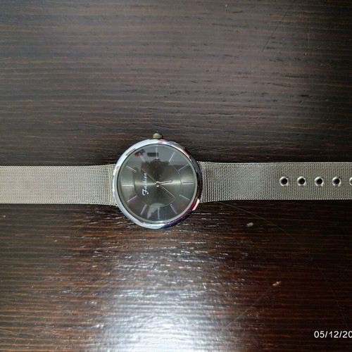 Steel watch like new with woven chain
