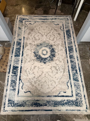 Rug used with slight burn marks, 225x145 cm