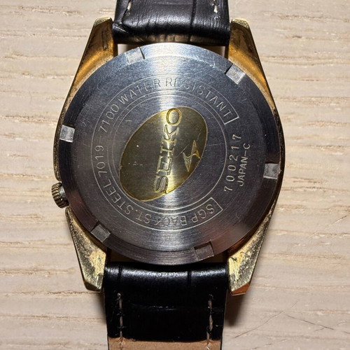 Seiko Sport 5 watch used with black leather strap and daydate