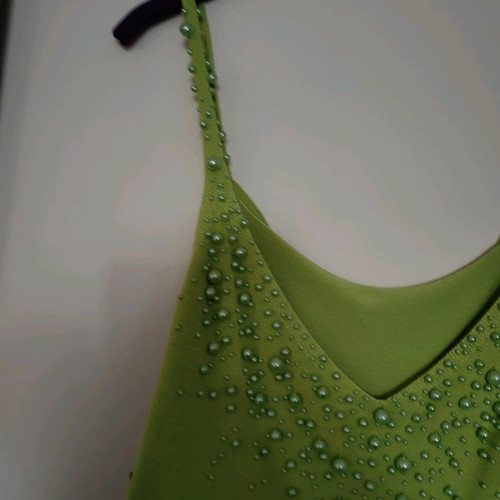 Knitted top used green lime with green pearls, size S