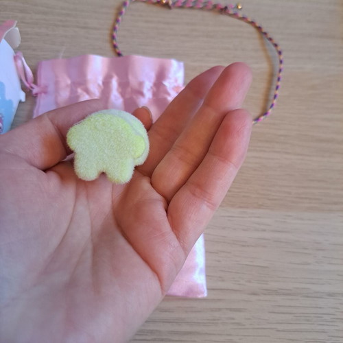 Labunoma necklace with colorful fuzzy smiling monster charm, like new