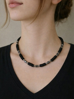 Necklace with black and metallic beads in minimal ethnic style like new