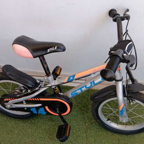 Boy's city bike silver with blue and orange designs like new with training wheels