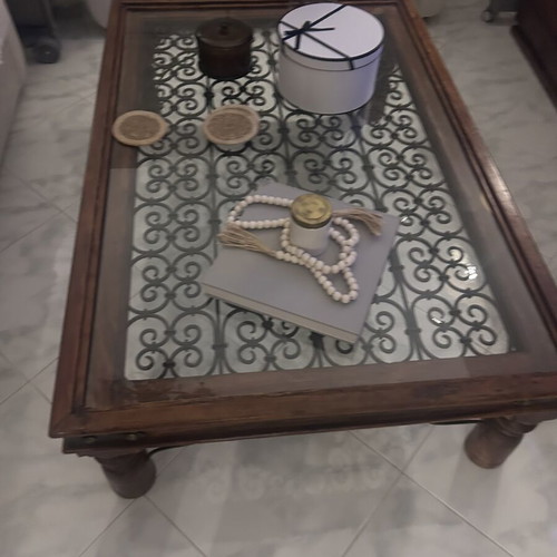 Large wooden coffee table with glass and metal decoration