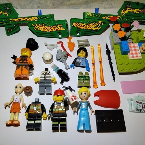 Lego figures, accessories and pieces used, all together