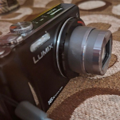 Panasonic Lumix DMC-TZ19 digital camera like new with Leica lens and tripod