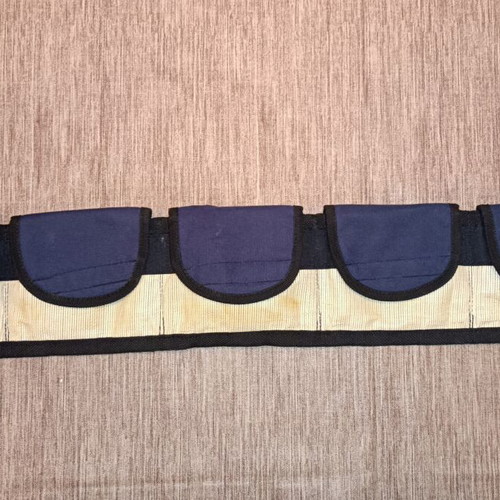 Diving weight belt with pouches used