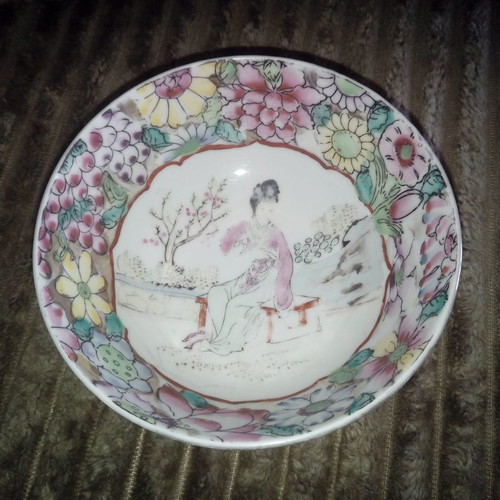 Vintage porcelain bowl used from the Far East