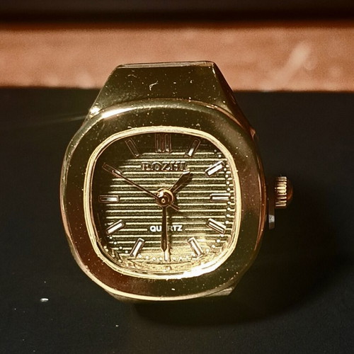 Ring watch with khaki dial and gold bracelet