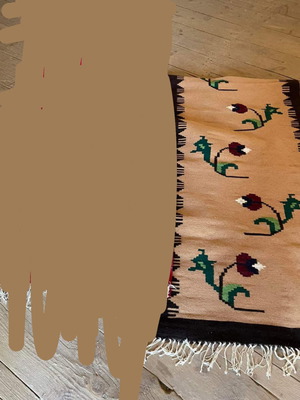 Handmade rug used, woven on loom