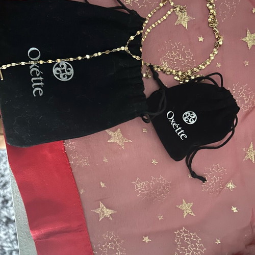 Oxette jewelry set like new, gold necklace and earrings