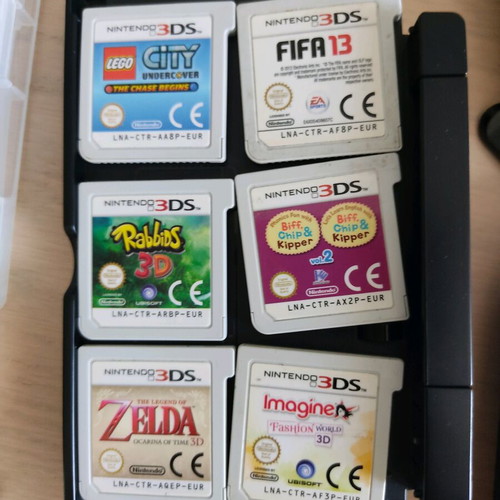 Nintendo 3DS (2011) like new, complete bundle with 12 games and accessories